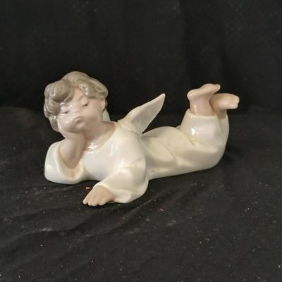Lladro "Angel Laying Down" (also known as "Angel, Reclining") with the model number #4541