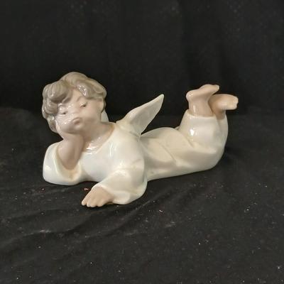 Lladro "Angel Laying Down" (also known as "Angel, Reclining") with the model number #4541
