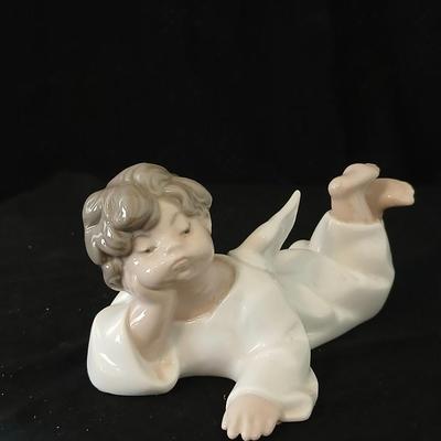 Lladro "Angel Laying Down" (also known as "Angel, Reclining") with the model number #4541