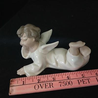 Lladro "Angel Laying Down" (also known as "Angel, Reclining") with the model number #4541