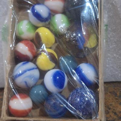 Sale Photo Thumbnail #128: handful of marbles