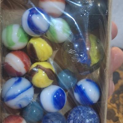 Sale Photo Thumbnail #127: handful of marbles