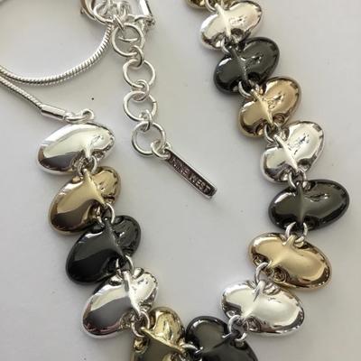 Very nice silver gold toned, nine West necklace
