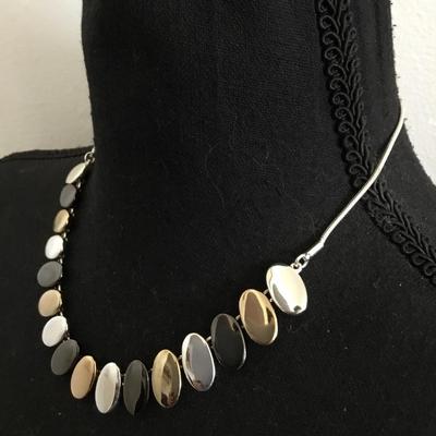 Very nice silver gold toned, nine West necklace