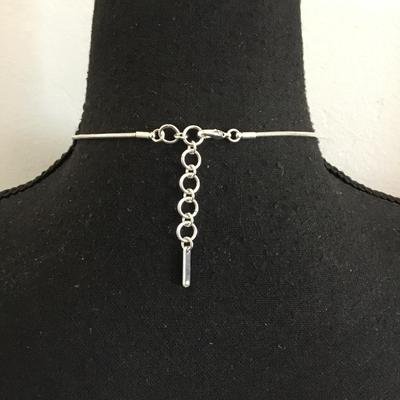 Very nice silver gold toned, nine West necklace