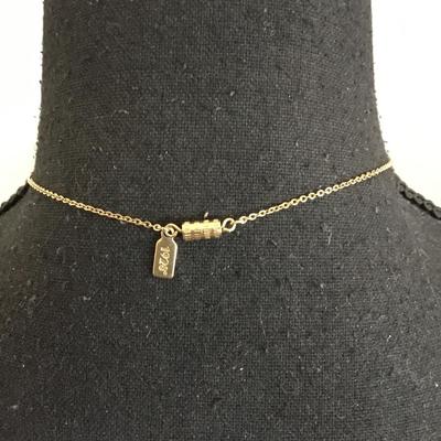 Vintage 1928 gold tone, skeleton heart key pendant, very dainty