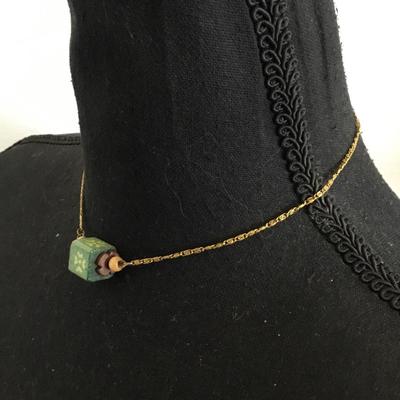Cute vintage gold tone unique wooden pendant