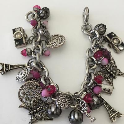 Beautiful vintage, silver toned, very nice charm cr bracelet