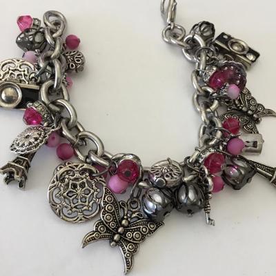 Beautiful vintage, silver toned, very nice charm cr bracelet