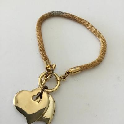 Mid century, goldtone, mesh snake, chain, toggle bracelet, rhinestone heart charms has somewhere blemishes
