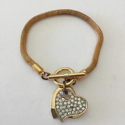 Mid century, goldtone, mesh snake, chain, toggle bracelet, rhinestone heart charms has somewhere blemishes