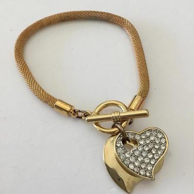 Mid century, goldtone, mesh snake, chain, toggle bracelet, rhinestone heart charms has somewhere blemishes
