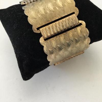 Vintage, gold tone textured panel, locking bracelet