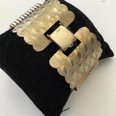 Vintage, gold tone textured panel, locking bracelet