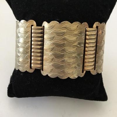 Vintage, gold tone textured panel, locking bracelet