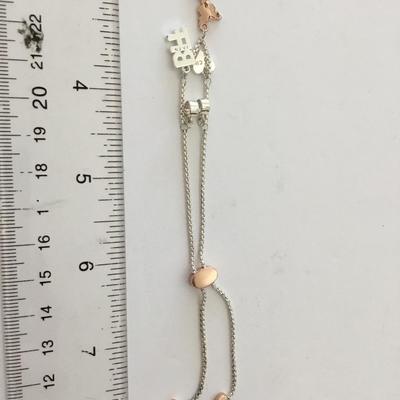 Beautiful rose, gold, toned, silver toned, beautiful slider bracelet