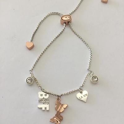 Beautiful rose, gold, toned, silver toned, beautiful slider bracelet