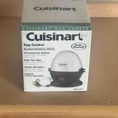 Sale Photo Thumbnail #10: Cuisinart Egg Cooker (Model CEC-7) from the Brushed Stainless Series. Features auto-shutoff, indicator light, and audible signal for perfectly poached, soft, medium, or hard-boiled eggs.
Unit appears new in box, unused and still factory-wrapped. Includes 