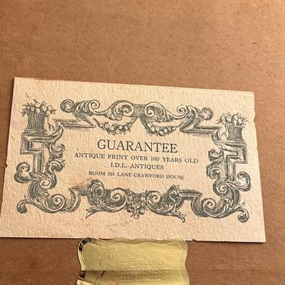 Sale Photo Thumbnail #18: Pair of finely framed antique architectural engravings with pink mats and ornate gold frames.
Titles include “Bowyer House” and “The Neckinger Tide-Stream, Bermondsey.”
Both prints bear certificates from I.D.L. Antiques guaranteeing they are over 