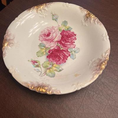 Sale Photo Thumbnail #28: Charming antique Staffordshire porcelain plate by W. Ridgway & Son, England, featuring a lovely bouquet of deep pink and red roses with raised relief details and gold trim. The back bears the WRS crown mark, used between 1830 and 1860.
Displays well as a 