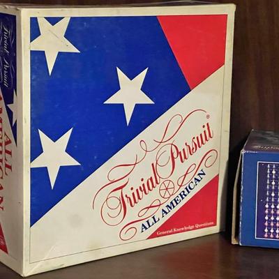 Sale Photo Thumbnail #50: Fun and collectible trio celebrating American trivia, politics, and pride! Includes vintage and modern boxed sets — all with strong patriotic themes.
Includes:
1️⃣ Trivial Pursuit: All American Edition – General Knowledge Questions, Parker Brother