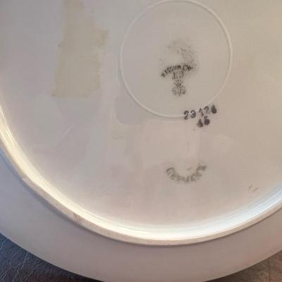 Sale Photo Thumbnail #51: Charming pair of early 20th-century German porcelain serving plates featuring hand-painted florals and grapevine motifs with gold trim.
Includes:
1️⃣ Porcelain handled tray with purple grape cluster design – marked “Jäger & Co Bavaria Germany,”