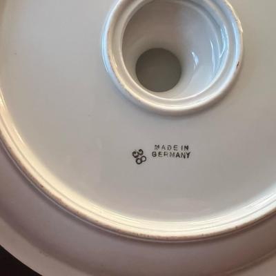 Sale Photo Thumbnail #53: Charming pair of early 20th-century German porcelain serving plates featuring hand-painted florals and grapevine motifs with gold trim.
Includes:
1️⃣ Porcelain handled tray with purple grape cluster design – marked “Jäger & Co Bavaria Germany,”