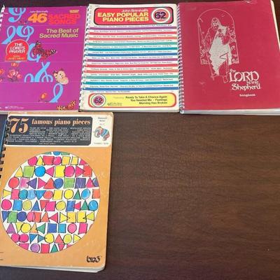 Sale Photo Thumbnail #71: Collection of four vintage spiral-bound piano instruction and song books featuring popular, classical, and sacred music from the 1960s–1980s.
Includes:
1.	75 Famous Piano Pieces – Bess Music Publishers, Merrimac Series No. 1 (colorful geometric cover;
