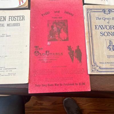 Sale Photo Thumbnail #79: Assorted collection of vintage and mid-century softcover songbooks featuring classic Christmas carols, parlor songs, and Americana standards. A nostalgic lot perfect for pianists, collectors, or seasonal décor.
Includes:
1.	Carols of Christmas – Music 