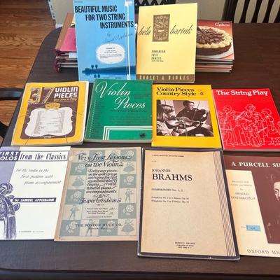 Sale Photo Thumbnail #81: Collection of vintage and mid-century violin and string instruction books and sheet music featuring classical composers and teaching guides. A strong lot for teachers, students, and collectors of string repertoire.
Includes:
•	Beautiful Music for Two St