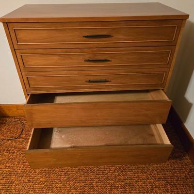 Mid-century modern tall four-drawer highboy dresser by Dixie Furniture Co.