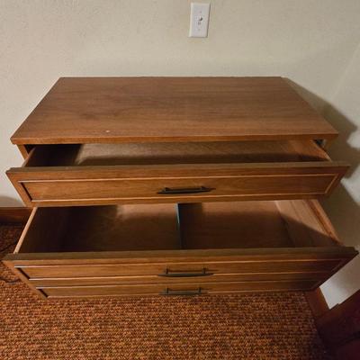 Mid-century modern tall four-drawer highboy dresser by Dixie Furniture Co.