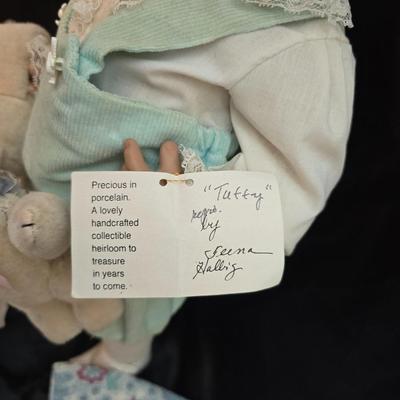 Handcrafted porcelain doll collectible named "Tuffy", created by Seena Hallig