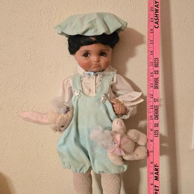 Handcrafted porcelain doll collectible named "Tuffy", created by Seena Hallig
