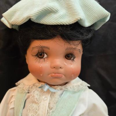 Handcrafted porcelain doll collectible named "Tuffy", created by Seena Hallig