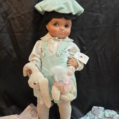 Handcrafted porcelain doll collectible named "Tuffy", created by Seena Hallig