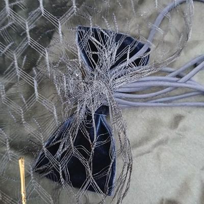 Mid-Century Vintage Hat Box with an assortment of Women's Collectible hats / veils & Vintage linen handkerchiefs.