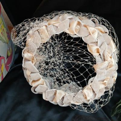 Mid-Century Vintage Hat Box with an assortment of Women's Collectible hats / veils & Vintage linen handkerchiefs.
