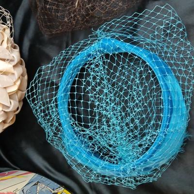 Mid-Century Vintage Hat Box with an assortment of Women's Collectible hats / veils & Vintage linen handkerchiefs.