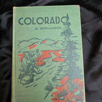 Wooden R& B bookends with a collection of vintage books - Five little peppers at school, Colorado, and an antique German Sunday...