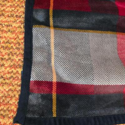 Cuddl Duds® Red Plaid blanket with a vintage Faribo red, black, and white plaid acrylic throw blanket with fringe, made by the Faribault...