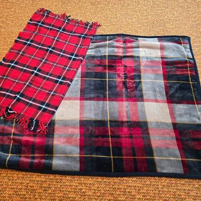 Cuddl Duds® Red Plaid blanket with a vintage Faribo red, black, and white plaid acrylic throw blanket with fringe, made by the Faribault...