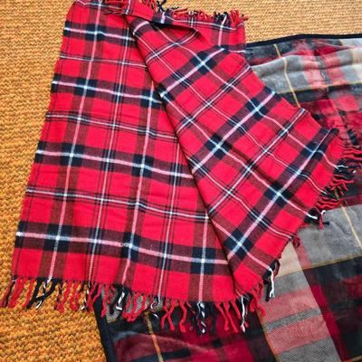 Cuddl Duds® Red Plaid blanket with a vintage Faribo red, black, and white plaid acrylic throw blanket with fringe, made by the Faribault...