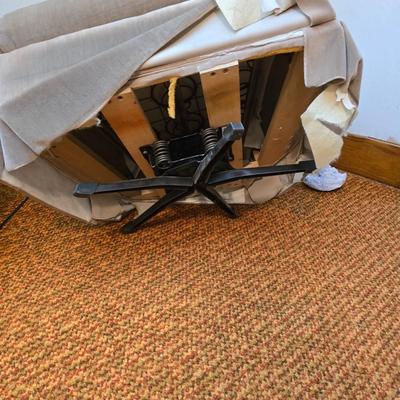 Pair of Best Chairs Inc. upholstered swivel rocker chairs with tufted backs and skirted bases.