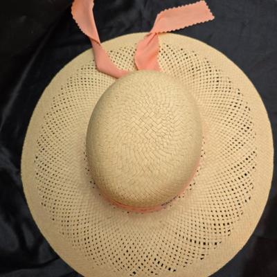 Two vintage straw sun hats for the ladies - wide-brimmed straw sun hat with a pink Can Cun ribbon