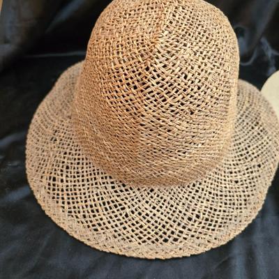 Two vintage straw sun hats for the ladies - wide-brimmed straw sun hat with a pink Can Cun ribbon