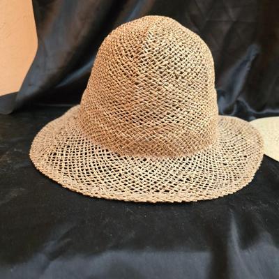 Two vintage straw sun hats for the ladies - wide-brimmed straw sun hat with a pink Can Cun ribbon