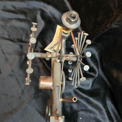 Days Of Splendor” John Deere framed artwork and a brutalist metal nail sculpture depicting a farmer on a tractor, created by artist...