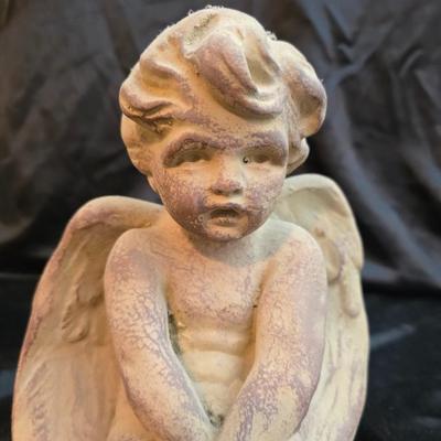sitting cherub angel garden statue with two faux decorative garden stones