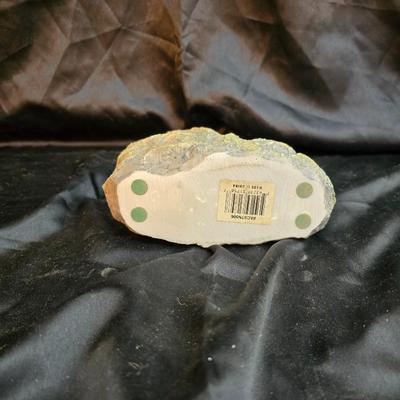 sitting cherub angel garden statue with two faux decorative garden stones